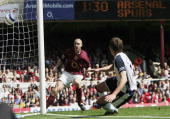 Michael Carrick was awarded the Man of the Match award, and at least Thierry Henry showed a bit of grace, which is more than can be said for his manager. This shot was taken as he missed a great chance just before the break