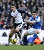 Michael Carrick seen in action with Birmingham's David Dunn
