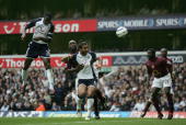 Ledley rises to head home Michael carrick's free kick