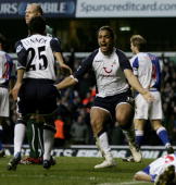 Mido and Lennon celebrate Spurs winner