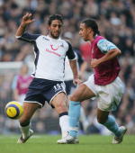 Both the goalscorers seen in this action shot - Mido and Ferdinand