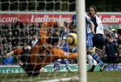 Mido gets a neat touch to Stalteri's cross to beat Pollitt for Spurs first goal.