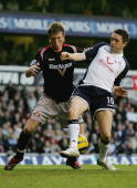 Robbie Keane in a scamble with Danny Collins, similar to that which led to his second half goal for Spurs