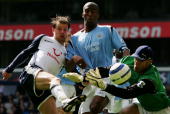 Teemu Tainio seen in close range action with Man City keeper David James