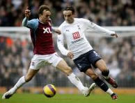 Dimiatar Berbatov in action against Mark Noble!