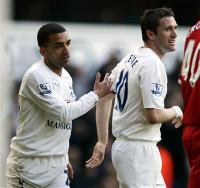 Aaron Lennon and Robbie Keane celebrate the Spurs goal