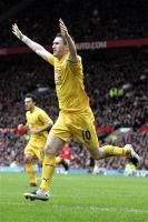 Robbie Keane celebrates goal number 18 this season