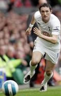 Robbie Keane in action at Anfield this season