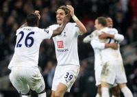 Ledley King and Jonathan Woodgate embrace to celebrate a mighty victory!