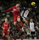 Jermaine Jenas in a good action shot, in the corresponding game last season, challenging for the ball with Xabi Alonso, who scored another wonder goal this week