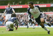 Aaron Lennon wheels away after scoring the deciding goal of the corresponding game of last season