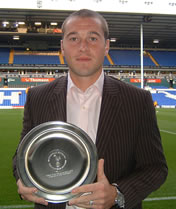 A very focussed looking Paul Robinson proudly holds this fine Swedish pewter trophy