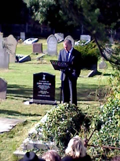 Club Director Paul Barber speaks at the graveside