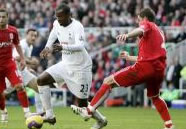 Darren Bent gets the better of ex-Spur Luke Young, in the away game last November. Bent scored one of his 8 goals this season in Juande Ramos's first league game in charge of Spurs.