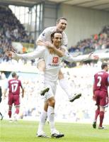 Dimitar Berbatov sent Spurs on their way to victory with his two early headed goals.