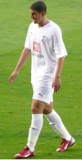 Adel walks away looking somewhat disconsolate