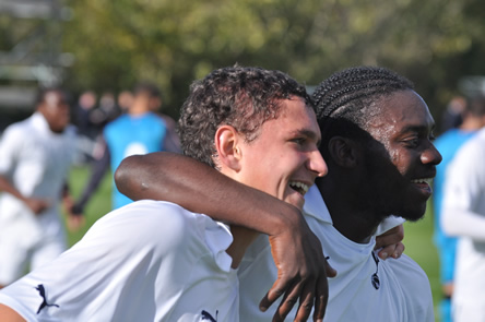 Laste Dombaxe and scorer Milos Veljkovic celebrate Spurs' second goal