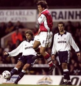 Tim Sherwood curls a magnificent free kick past the desperate Ljungberg